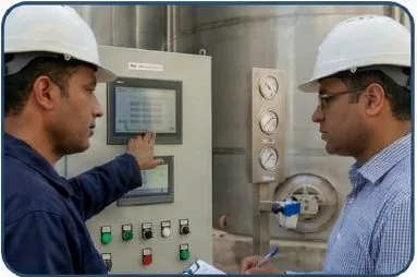 Engineers reviewing equipment controls